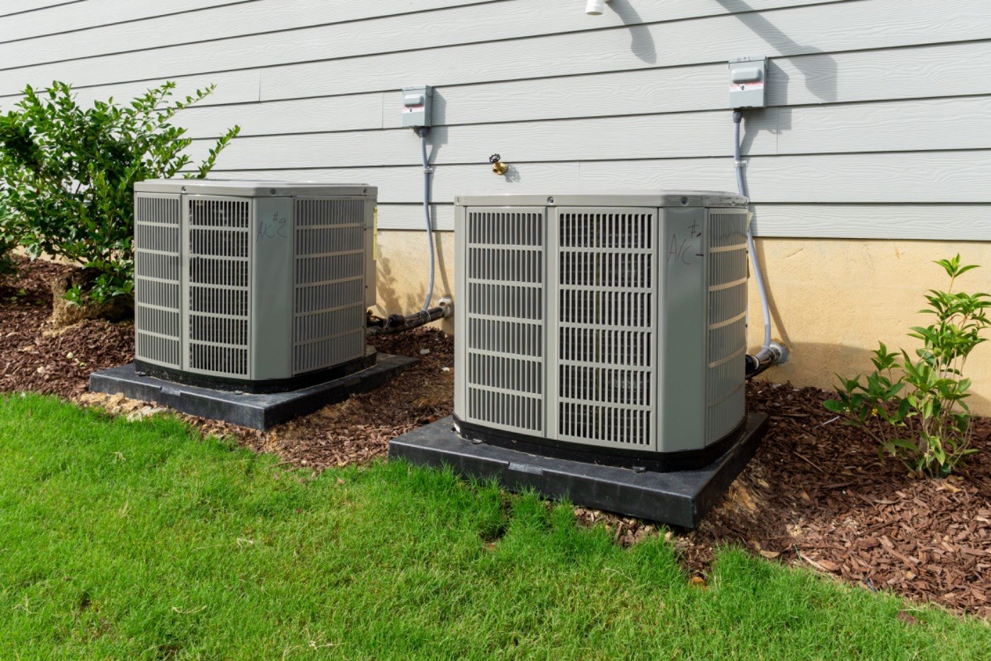 Residential air conditioning condenser units serviced by Hixon near Braselton, GA